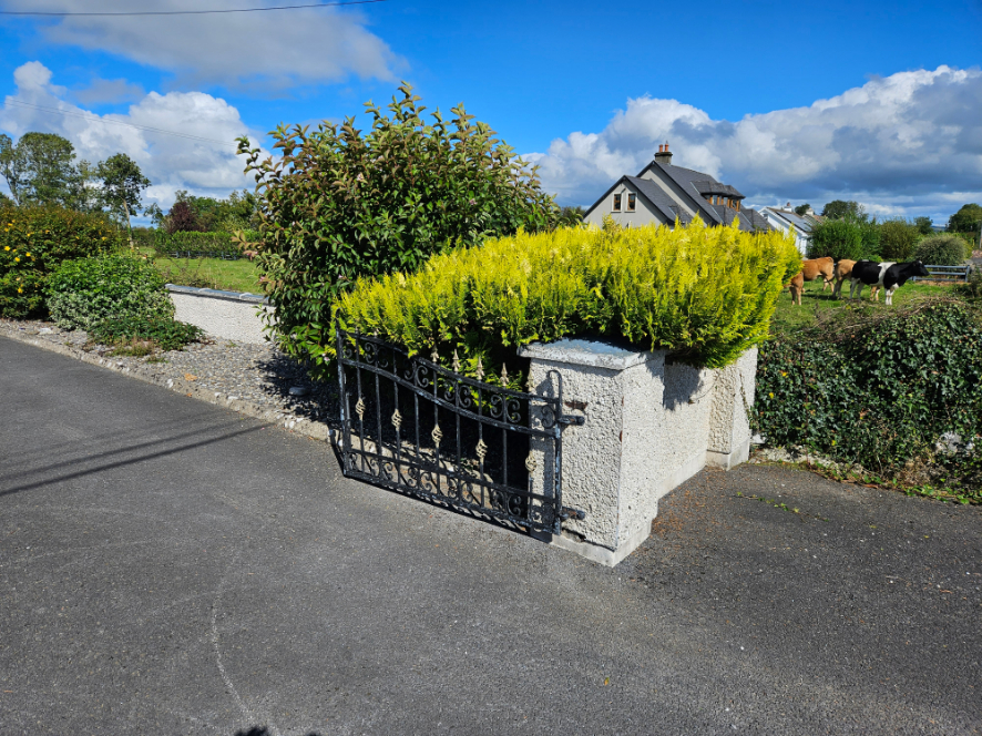 Driveway Entrance with Decorative Black Metal Gate — Alpha and Omega Refurbishment in Tuam, Galway