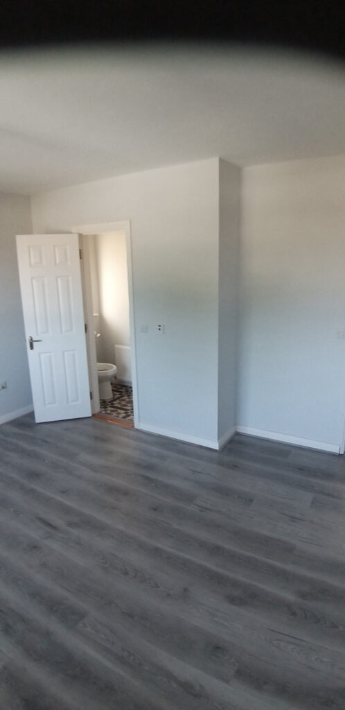 Clean and Modern Bedroom with A Bathroom — Alpha and Omega Refurbishment in Tuam, Galway