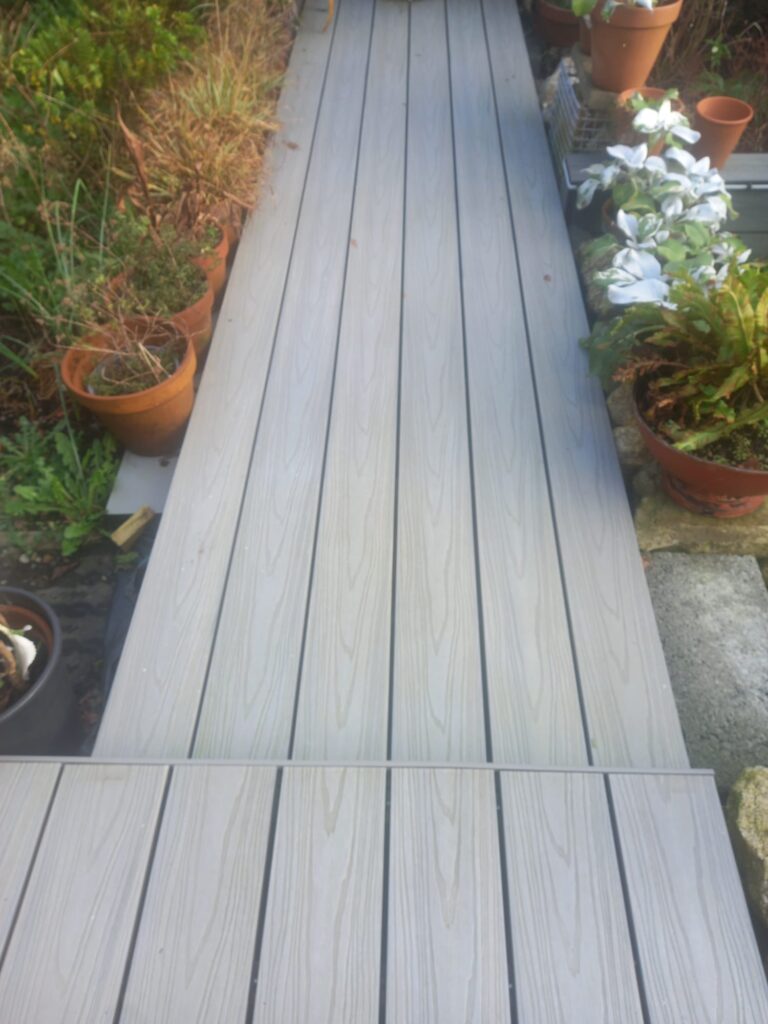 Wooden Pathway Surrounded by Plants — Alpha and Omega Refurbishment in Tuam, Galway