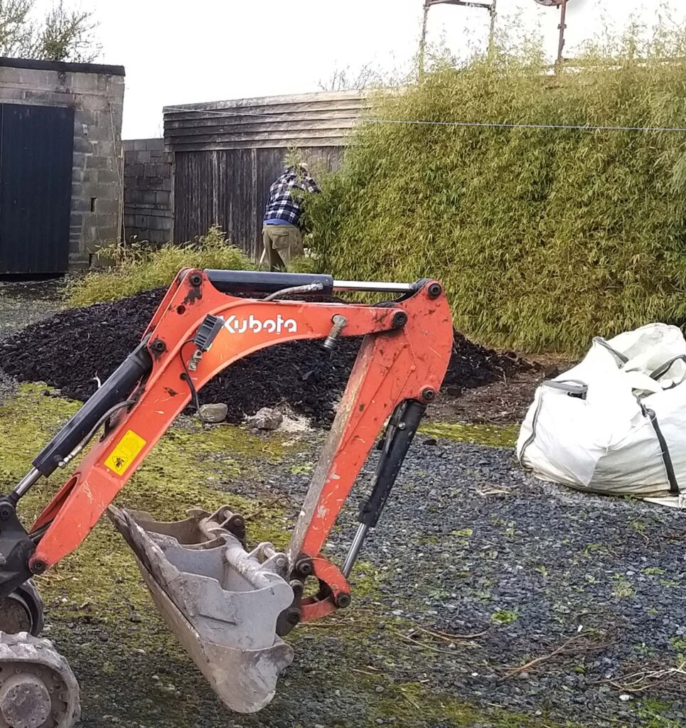 Digger Next to Shrubs — Alpha and Omega Refurbishment in Tuam, Galway