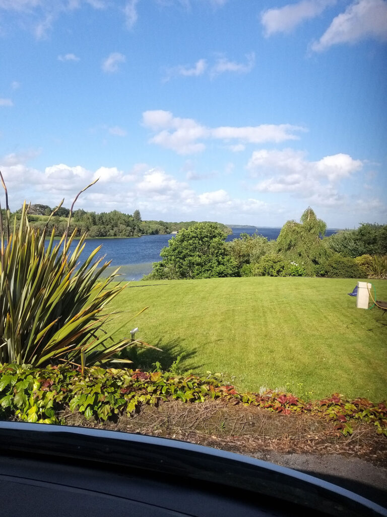 A Scenic Landscape with A Lush Green Lawn and Vibrant Foliage — Alpha and Omega Refurbishment in Tuam, Galway