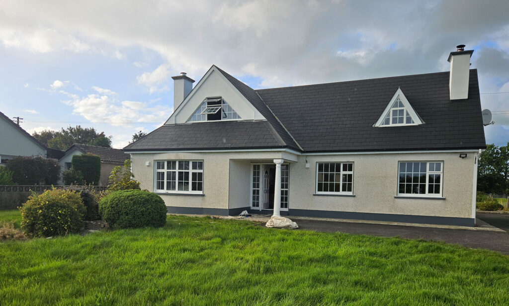 A House with Blue Paint After Being Serviced — Alpha and Omega Refurbishment in Tuam, Galway