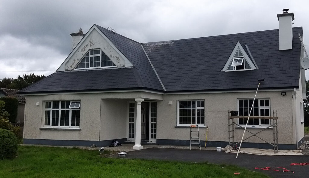 A House with Blue Paint Being Serviced — Alpha and Omega Refurbishment in Tuam, Galway