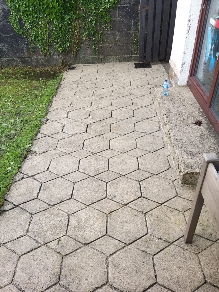 Backyard Area with Stone Patio— Alpha and Omega Refurbishment in Tuam, Galway